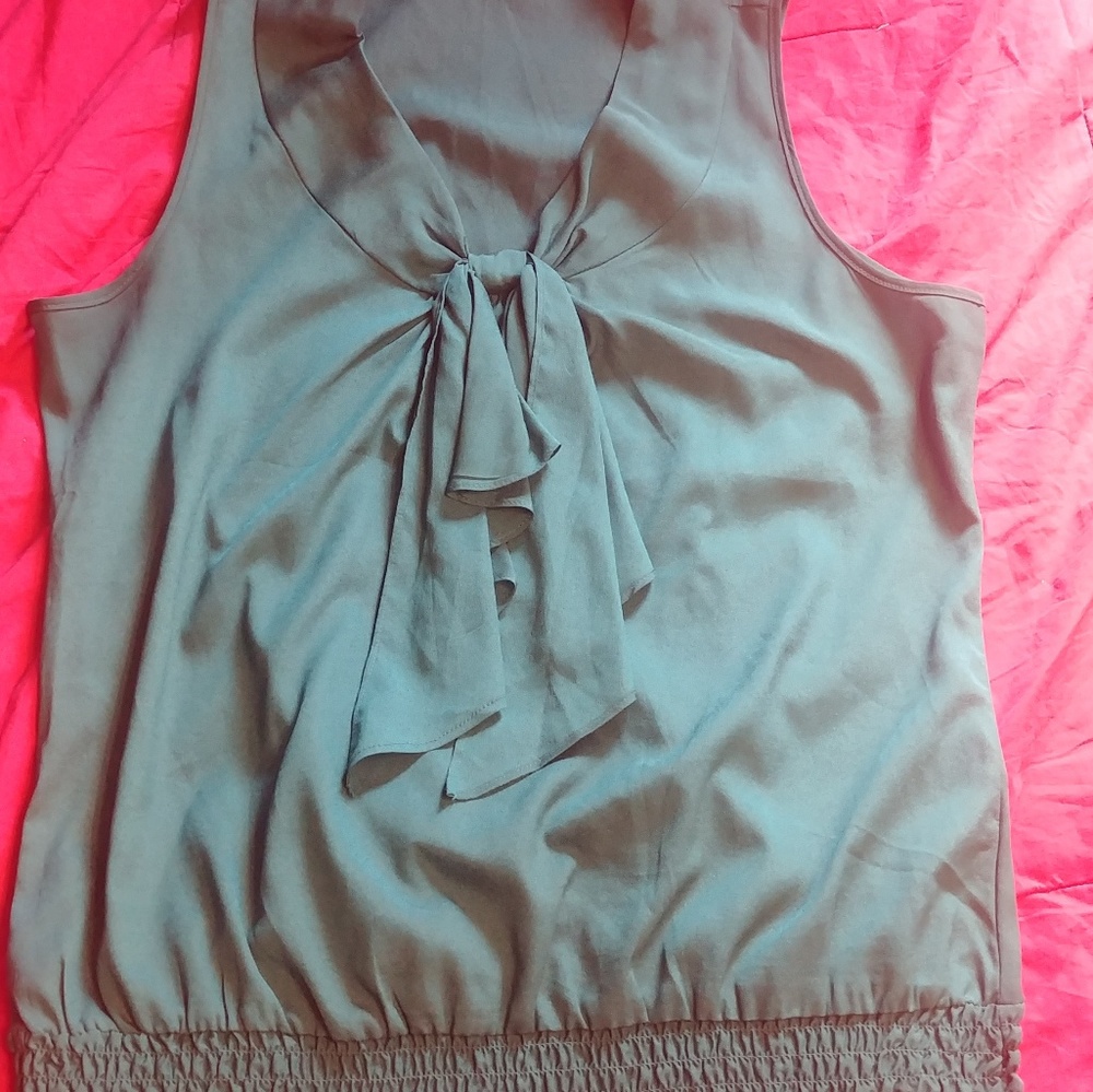 Teal sleeveless blouse